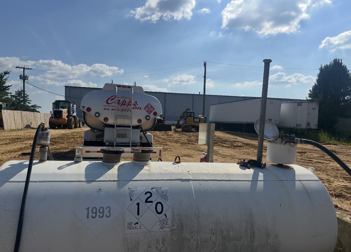 Tim Capps Oil Co. tanker filling an on-site fuel storage tank